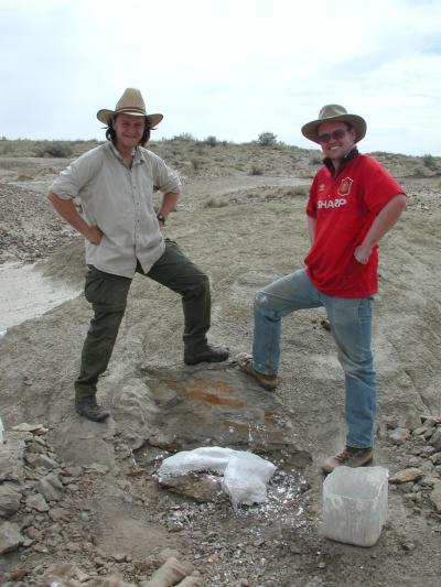 Arjan Boere and Denver Fowler stand over part of the frill of Navajoceratops. 2002 Photo by R Sullivan.