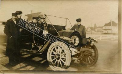 Photo of the maser family in the Maser ‘s Mitchell car. Written on back: Ann Maser, Jane Maser, Viola Maser, and Fred Maser. 1910-11.