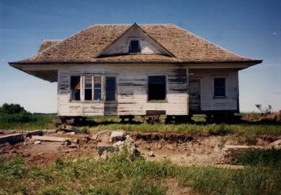 The farmhouse in 1992 after it was moved off its deteriorating basement.