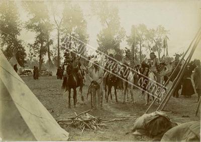 Sepia tone photo of Native American Encampment, no information about the tribe.