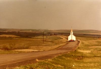 The Church being moved from Taylor in 1981. Photos courtesy of Loren Myran.